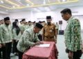 Bupati Al-Farlaky Kukuhkan Pengurus DPC APDESI Aceh Timur 2026–2031