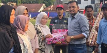 Panitia KPA Simpang Ulim Cup I Bagikan 10 Hadiah Doorprize, Suasana Lapangan Makin Meriah